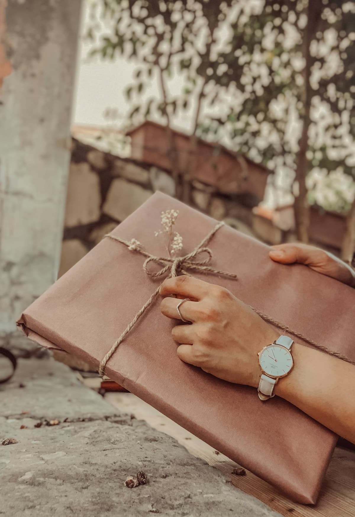 Silver ring resting on a brown book, elegant and intimate